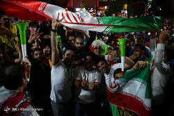 شادی مردم مشهد پس از پیروزی تیم ملی فوتبال مقابل مراکش